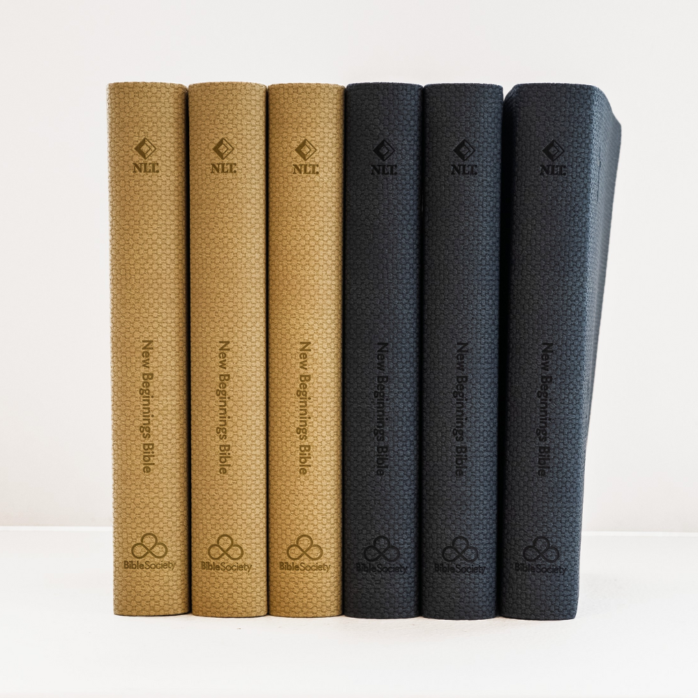 New Beginnings Bible in NLT translation with elegant premium textured flexicover side binding in Navy and Natural colours.
